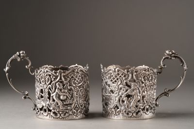 pair of antique silverplated cups with floral designs