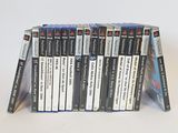 a lot of dvds stacked on top of each other