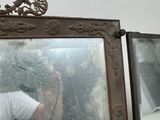 a man taking a selfie in front of a mirror