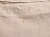 a close up of a piece of fabric with a hole in it