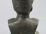 a bronze bust of a man with a hat on it
