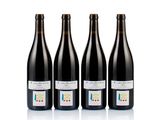 three bottles of wine are lined up on a white surface