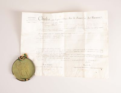 a close up of a piece of paper with a coin on it