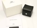 a box with a watch inside of it on a table