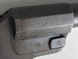 a gun that is sitting on top of a table