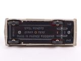 a close up of a small electronic device on a white surface