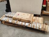a pile of boxes sitting on a pallet in a warehouse