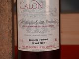 a bottle of wine that is sitting on a table