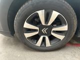 a close up of a tire on a car ' s rim