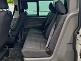 a white van with two seats in the back of it