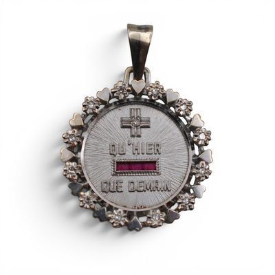an image of a silver medal with a red ribbon on it