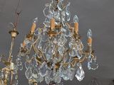 a chandelier hanging from the ceiling in a room