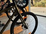 a bike that is parked inside of a garage