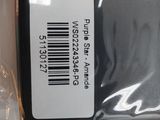 a bag with a label on it sitting on a table