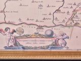 a picture of a picture of a map with angels on it