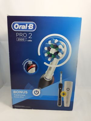 oral - b pro 2 electric toothbrush with bonus brush heads
