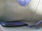 a close up of a purse with a zipper on it