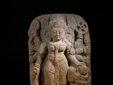 an image of a stone statue of a woman with a child