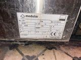 a picture of a machine that is sitting on a tile floor