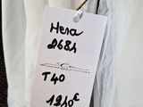 a label on a dress hanging on a hanger