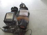 a lot of different types of electronic equipment on the floor