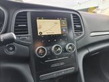 the dashboard of a car with a gps device in the center