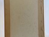 an easel with a painting on top of it in front of a white wall