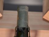 a bottle of wine that is sitting on a table