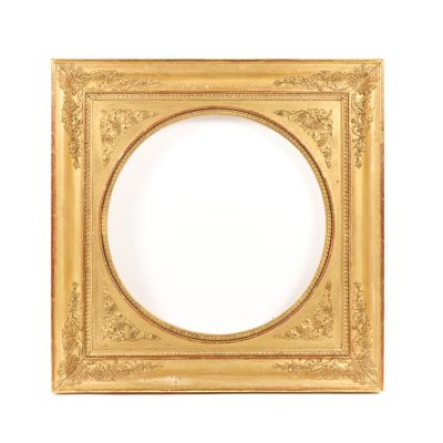 an antique gold frame with a white background