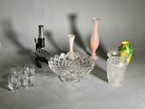 a lot of glass items that are sitting on a table