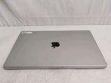 an apple macbook air laptop computer sitting on a white surface