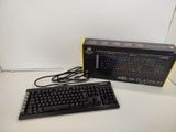 a box with a keyboard and a mouse on the table