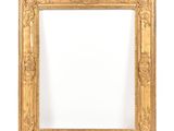 an ornate gold frame with a white background