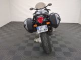 a motorcycle that is parked in a room