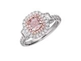 a pink and white diamond ring with baguets of diamonds