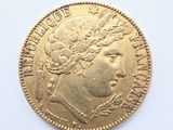 an image of a gold coin with a woman ' s head on it