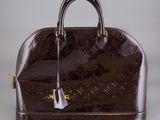louis vuitton monograme speedy bag in brown