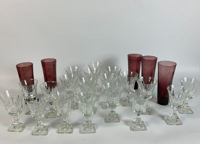 a lot of wine glasses sitting on a table
