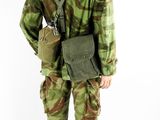 camouflage uniform of a soldier with a red beret and a red beret hat