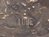 statue of a man with a feather on his head and the word love written on it