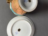 two cups that are sitting next to each other