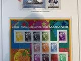 framed picture of a collection of stamps with a map of france