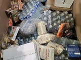 a cardboard box filled with many different types of items