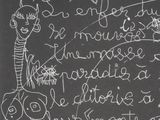 a blackboard with writing on it that has a drawing on it