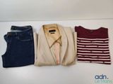 three men ' s shirts and jeans laid out on a white surface