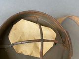 a metal pan with some food in it on a table