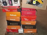 several boxes of cell phones are stacked on top of each other