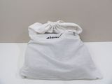 a white bag with a drawstring on top of it