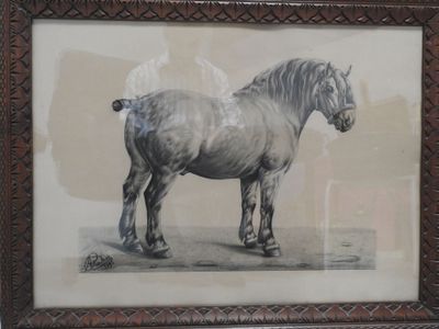tableau représentant un cheval, encadré dans un cadre en bois et accroché au mur