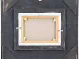 an image of a picture frame with a picture hanging on the wall